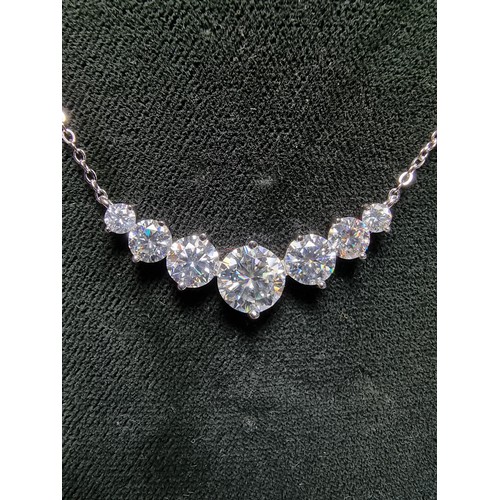 272 - Stunning brand new 925 silver necklace inset with seven Moissanite diamond stones featuring a large ... 