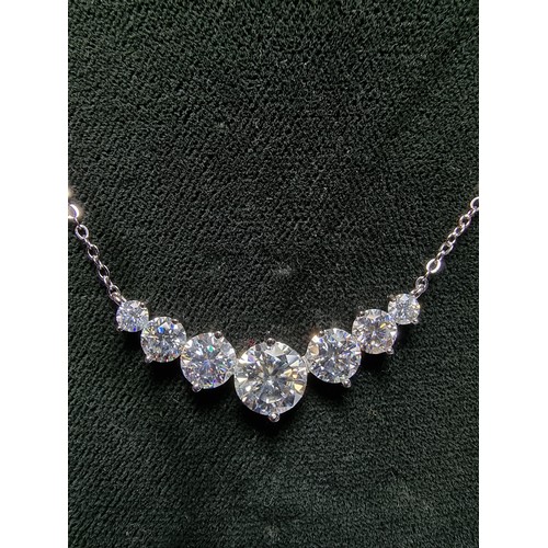 272 - Stunning brand new 925 silver necklace inset with seven Moissanite diamond stones featuring a large ... 