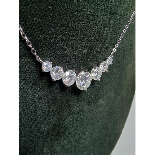 272 - Stunning brand new 925 silver necklace inset with seven Moissanite diamond stones featuring a large ... 