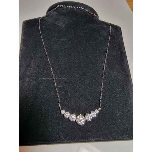 272 - Stunning brand new 925 silver necklace inset with seven Moissanite diamond stones featuring a large ... 