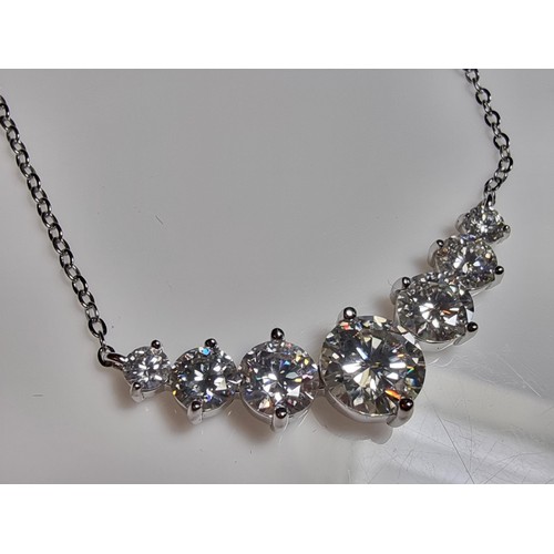 272 - Stunning brand new 925 silver necklace inset with seven Moissanite diamond stones featuring a large ... 