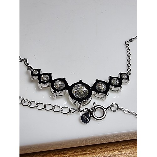 272 - Stunning brand new 925 silver necklace inset with seven Moissanite diamond stones featuring a large ... 