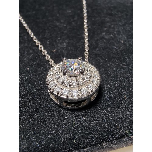 273 - Brand new stunning 925 silver cluster pendant inset with 0.5ct Moissanite diamond to the centre, sur... 