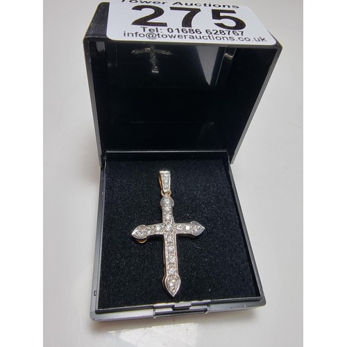 275 - Pretty hallmarked 9ct. yellow gold cross pendant inset with a qty of sparkly CZ stones. In clean con... 