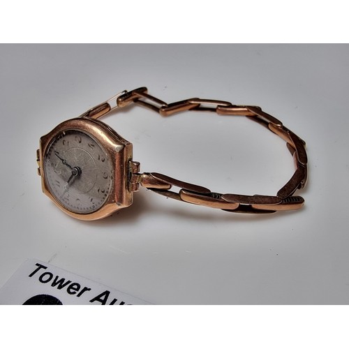 277 - Vintage hallmarked 9ct. rose gold wristwatch, case & strap is 9ct. rose gold. The watch is unfortuna... 