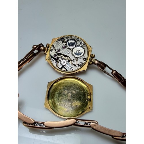 277 - Vintage hallmarked 9ct. rose gold wristwatch, case & strap is 9ct. rose gold. The watch is unfortuna... 