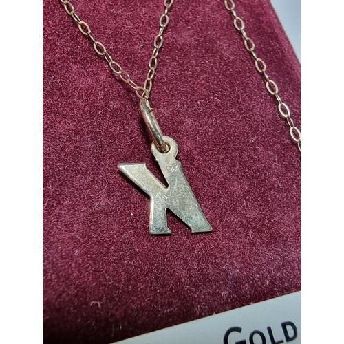 278 - Hallmarked 9ct. yellow gold letter 