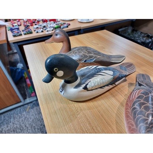 282 - 3x good quality solid wood hand painted decoy ducks, two are by benchmark, made in Hong Kong. The ot... 