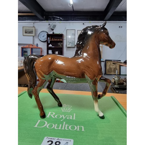 284 - Royal Doulton glazed porcelain horse figure complete with its original box. In excellent clean condi... 