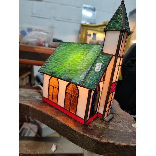 285 - Pretty genuine stained glass chapel formed table lamp, in very good condition with no damage. Presen... 