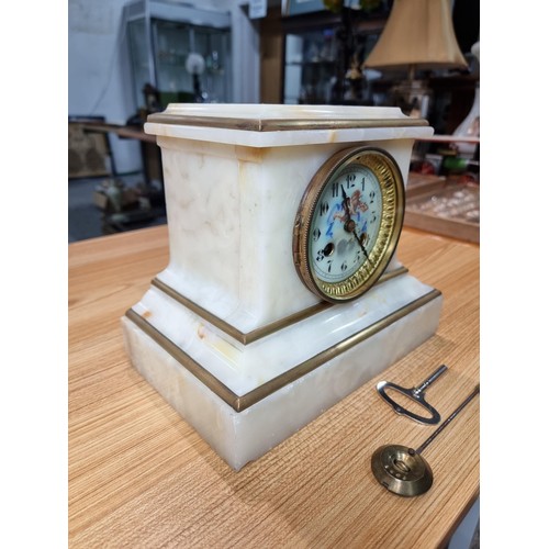 286 - Good quality antique solid white marble cased French mantle clock with gilded accents. Featuring a c... 