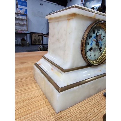 286 - Good quality antique solid white marble cased French mantle clock with gilded accents. Featuring a c... 