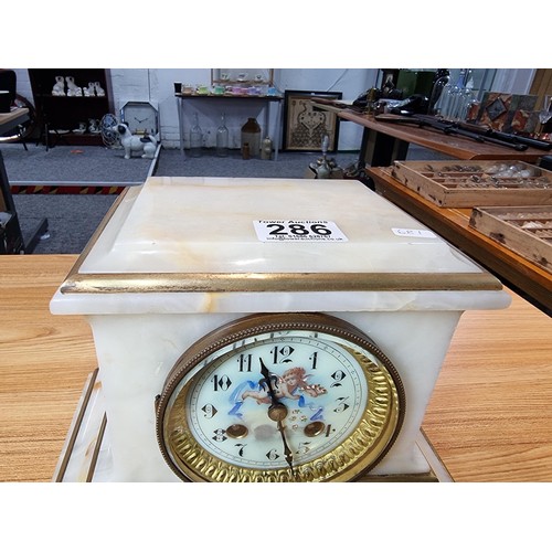 286 - Good quality antique solid white marble cased French mantle clock with gilded accents. Featuring a c... 