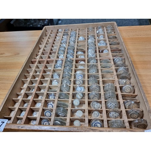 287 - Watchmakers job lot of wristwatch glass crystals in an organised tray containing hundreds of various... 