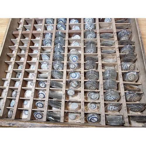 287 - Watchmakers job lot of wristwatch glass crystals in an organised tray containing hundreds of various... 