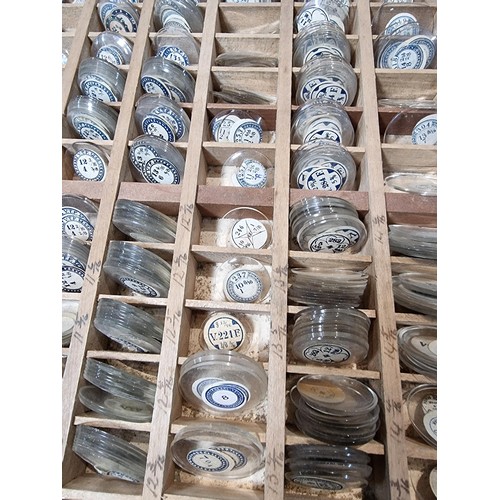 287 - Watchmakers job lot of wristwatch glass crystals in an organised tray containing hundreds of various... 