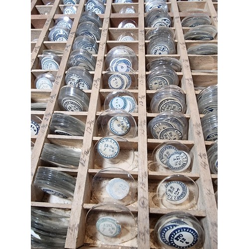 287 - Watchmakers job lot of wristwatch glass crystals in an organised tray containing hundreds of various... 