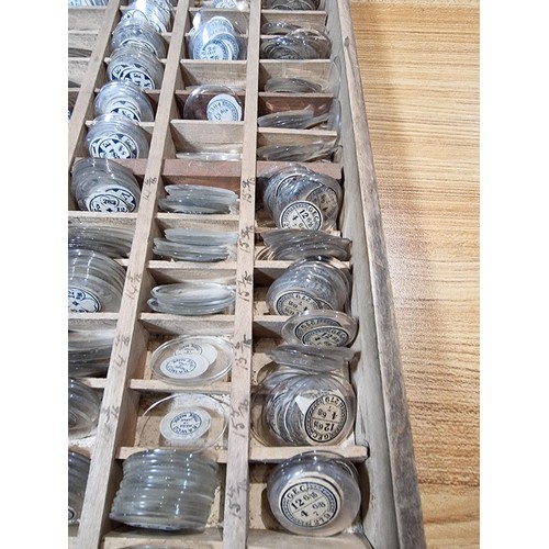 287 - Watchmakers job lot of wristwatch glass crystals in an organised tray containing hundreds of various... 