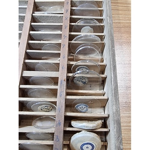 288 - Watchmakers job lot of wristwatch & fob watch glass crystals in an organised tray containing hundred... 