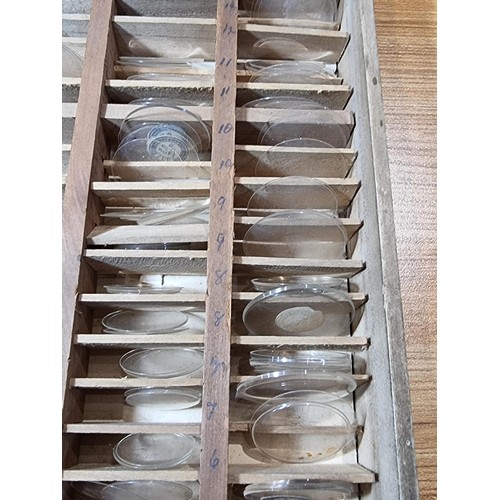 288 - Watchmakers job lot of wristwatch & fob watch glass crystals in an organised tray containing hundred... 