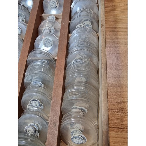 289 - Watchmakers job lot of pocket watch glass crystals in an organised tray containing hundreds of vario... 