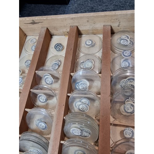 289 - Watchmakers job lot of pocket watch glass crystals in an organised tray containing hundreds of vario... 