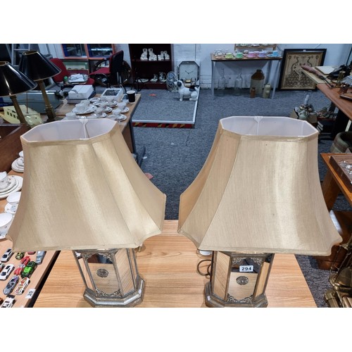 294 - Pair of large impressive table lamps with ornate gilded mirrored lamp bases. The lamp bases are mirr... 