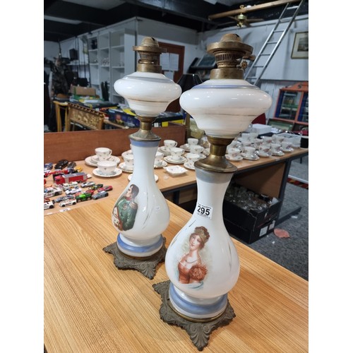 295 - Impressive pair of tall opaline glass oil lamps. Made in France. Circa 1920s. Presenting a portrait ... 