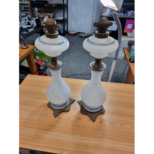 295 - Impressive pair of tall opaline glass oil lamps. Made in France. Circa 1920s. Presenting a portrait ... 