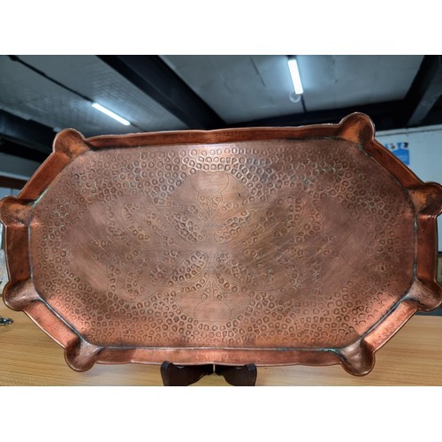 299 - Impressive antique hand beaten copper tray with an engraved Art Nouveau design to the centre by Eust... 