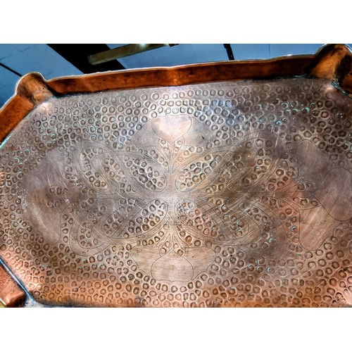 299 - Impressive antique hand beaten copper tray with an engraved Art Nouveau design to the centre by Eust... 