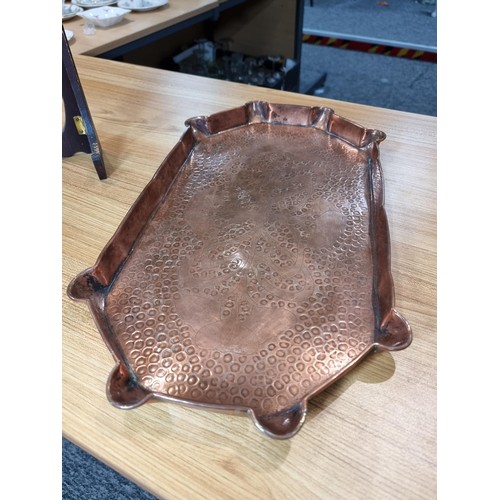 299 - Impressive antique hand beaten copper tray with an engraved Art Nouveau design to the centre by Eust... 