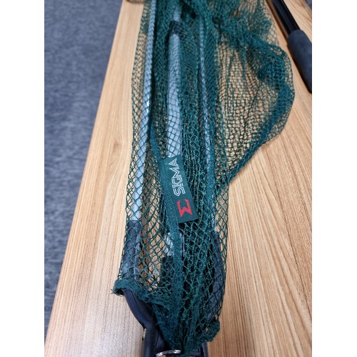 9 - An as new unused landing net with handle along with a Sigma landing net and NGT telescopic 2m net ha... 