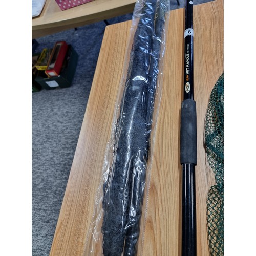 9 - An as new unused landing net with handle along with a Sigma landing net and NGT telescopic 2m net ha... 