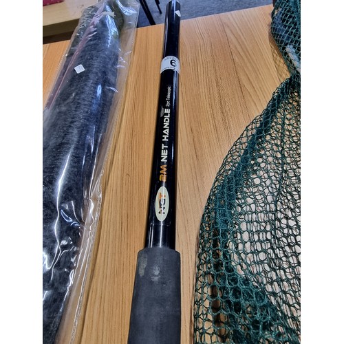 9 - An as new unused landing net with handle along with a Sigma landing net and NGT telescopic 2m net ha... 