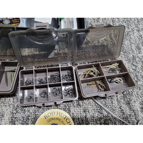 62A - A TF Gear fishing tackle box containing a quantity of various well organized tackle including weight... 