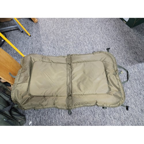 1 - A Crane sports fishing rod bag along with a Discovery CCX Hermit fishing brolly with its original ca... 