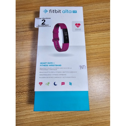 2 - A Fitbit Alta HR heart rate plus fitness wristband in good condition in its original box complete