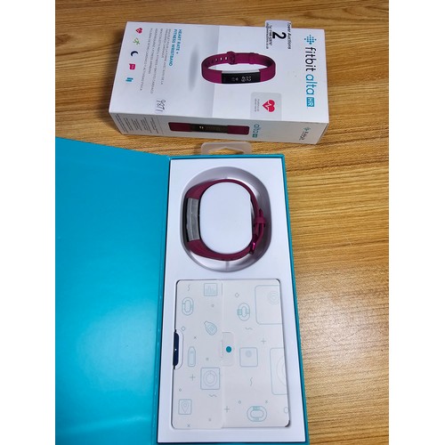 2 - A Fitbit Alta HR heart rate plus fitness wristband in good condition in its original box complete