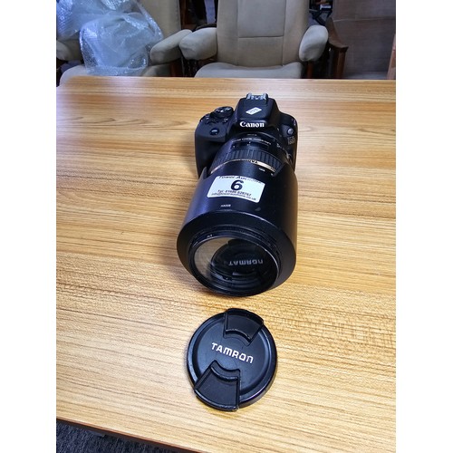 6 - A good quality Canon EOS 100D DSLR camera complete with a good Tamron SP70-300mm DI lens.