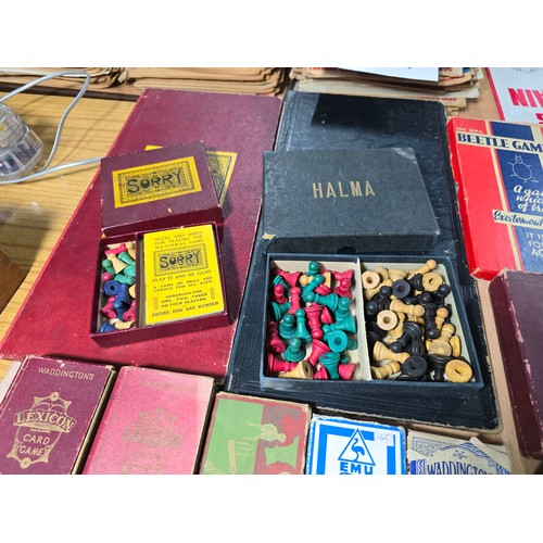 9 - A large selection of various vintage board games and card games to include 2 good antique domino set... 