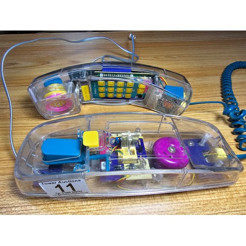 11 - An interesting vintage 1990's neon telephone by Mybelle model spotlight 753 in a clear perspex case ... 