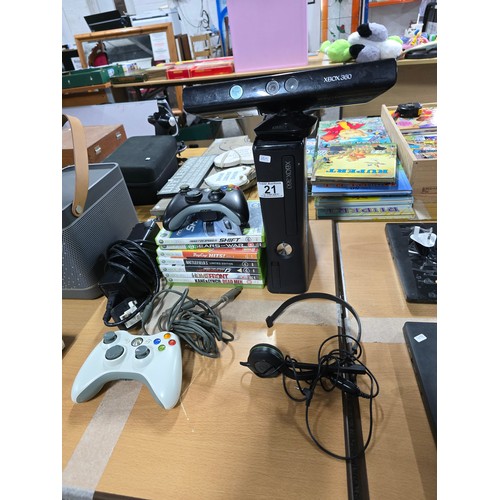 21 - A Micrsoft Xbox 360 games console complete with 10 good games, Xbox 360 connect, a headset and contr... 