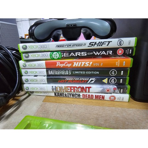 21 - A Micrsoft Xbox 360 games console complete with 10 good games, Xbox 360 connect, a headset and contr... 