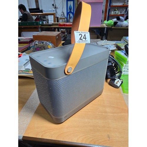 24 - A Bang & Olufsen Beolit 12, portable wifi  Bluetooth speaker, in full working order and expensive wh... 