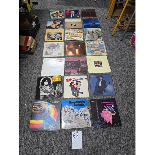 28 - Approx 21 vintage LP vinyl records to include some classic bands and artists, Black Sabbath Paranoid... 