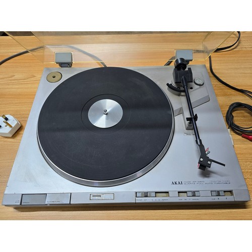 30 - A good vintage Akai AP-Q310 complete in working order with a stereo phono pre amp, SP-24A, for easy ... 