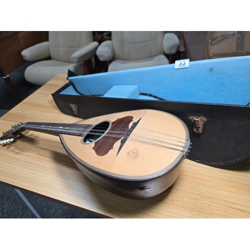 33 - A good antique cased bowlback mandolin by S.Sgroi mancuso, Catania, in excellent looked after condit... 