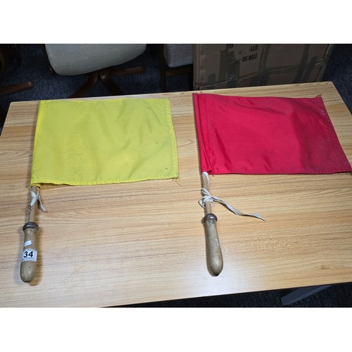 34 - A pair of vintage railway signalman flags in red and yellow, marked Python size 2, both in good orde... 