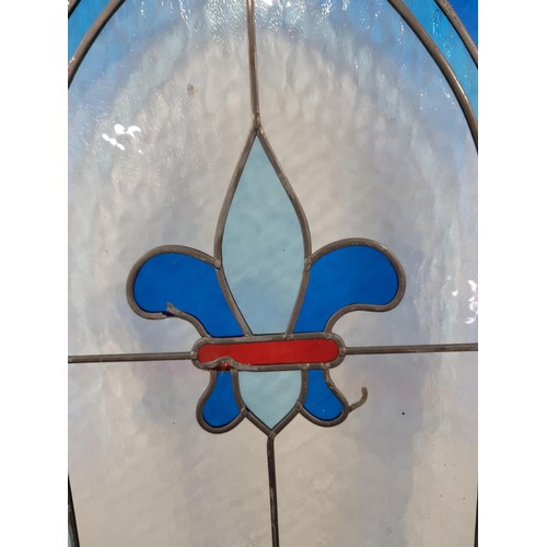 117 - Large good quality stain glass single window pane, with blue and red decoration in the form of fleur... 